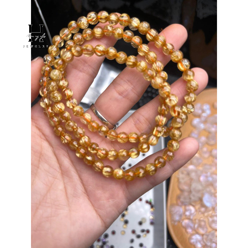 Vòng tay đá thạch anh tóc vàng vip 5 mm quấn 3 HANMYNGHE 1 Vòng tay đá thạch anh tóc vàng vip 5 mm quấn 3 HANMYNGHE